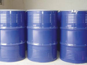 Three blue metal oil drums standing in a row in a storage room.