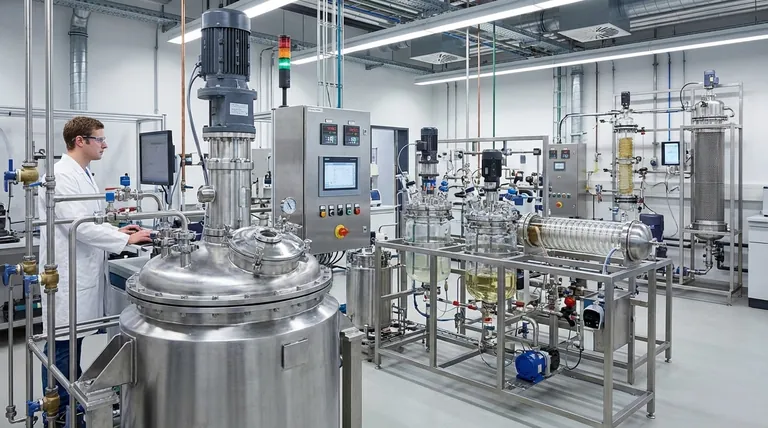 Factory – quartz-chem Scientist in a white lab coat operates stainless steel reactors and control panels in a modern industrial lab.