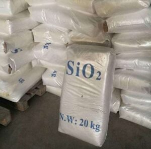 Nano Silicon Dioxide Bag of SiO2 (silicon dioxide) weighing 20 kg, stacked on pallets in a warehouse storage area.