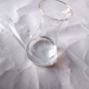3-Chloropropylmethyldimethoxysilane Clear glass lab flask with a narrow neck and a small amount of liquid on a textured white surface.