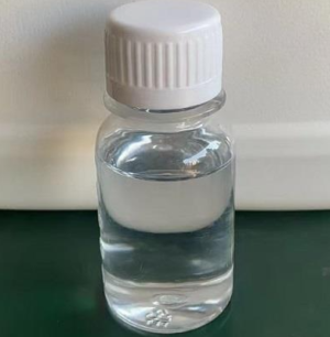 Methyltrimethoxysilane Small clear glass bottle with a white screw cap containing a colorless liquid on a dark surface.